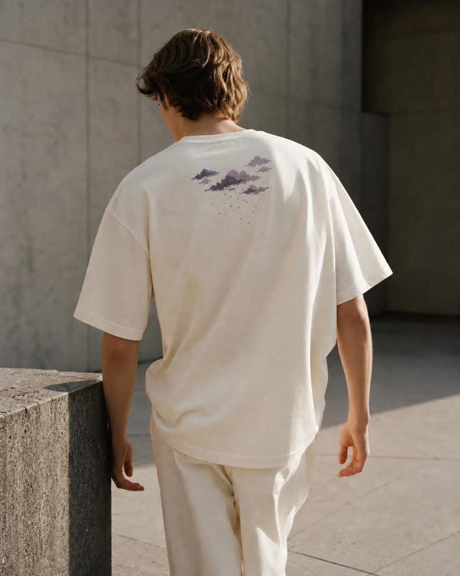Ecru tee with ink-violet pixel cloud back print